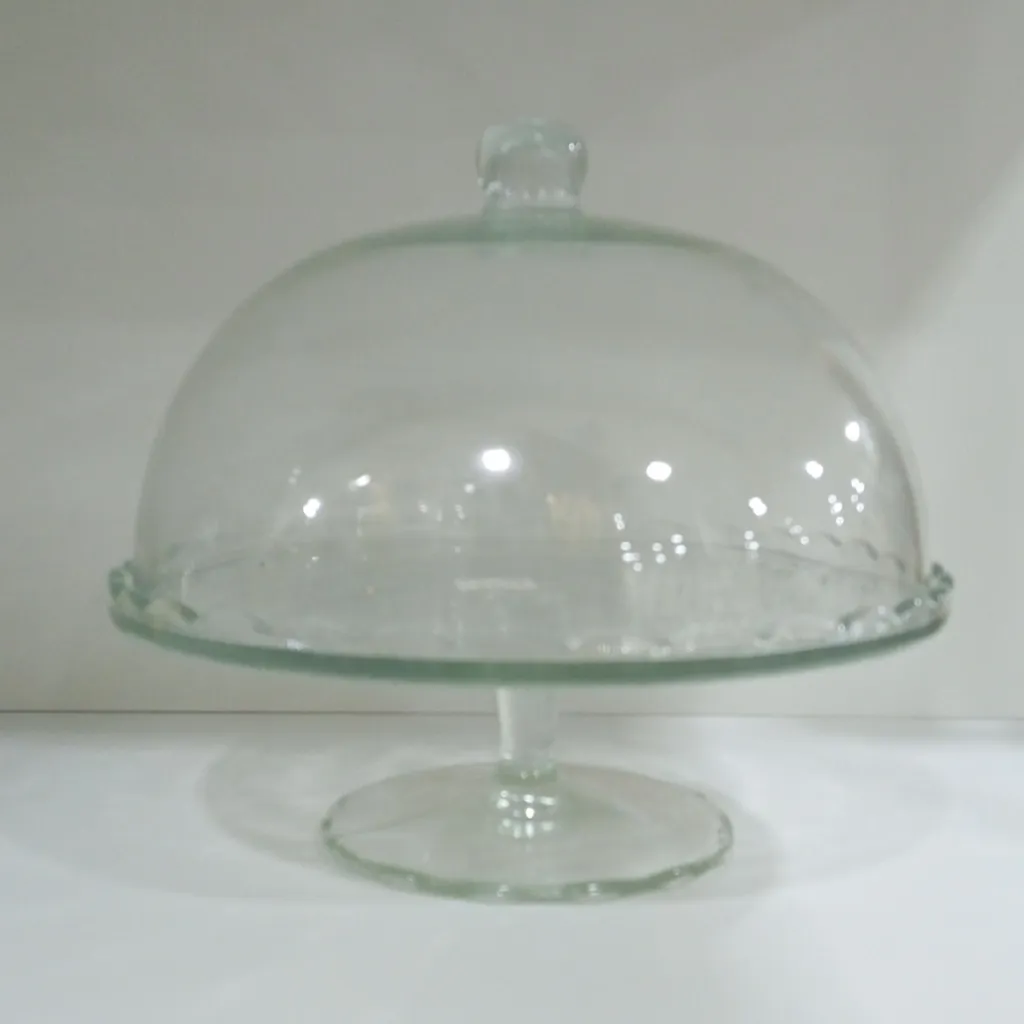 Glass pedestal cake stand with a matching glass dome (cloche)