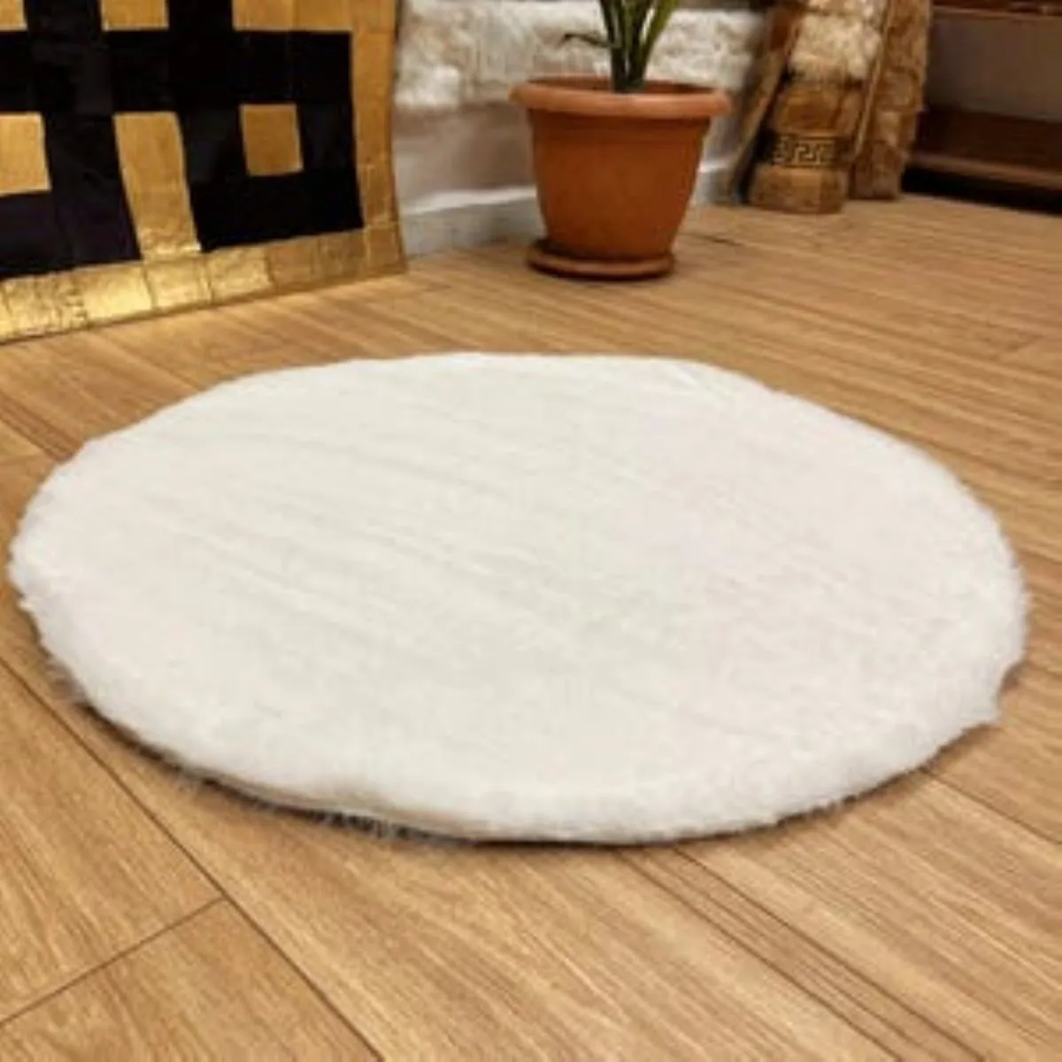 Round ivory wool mat (image 2 of 2)